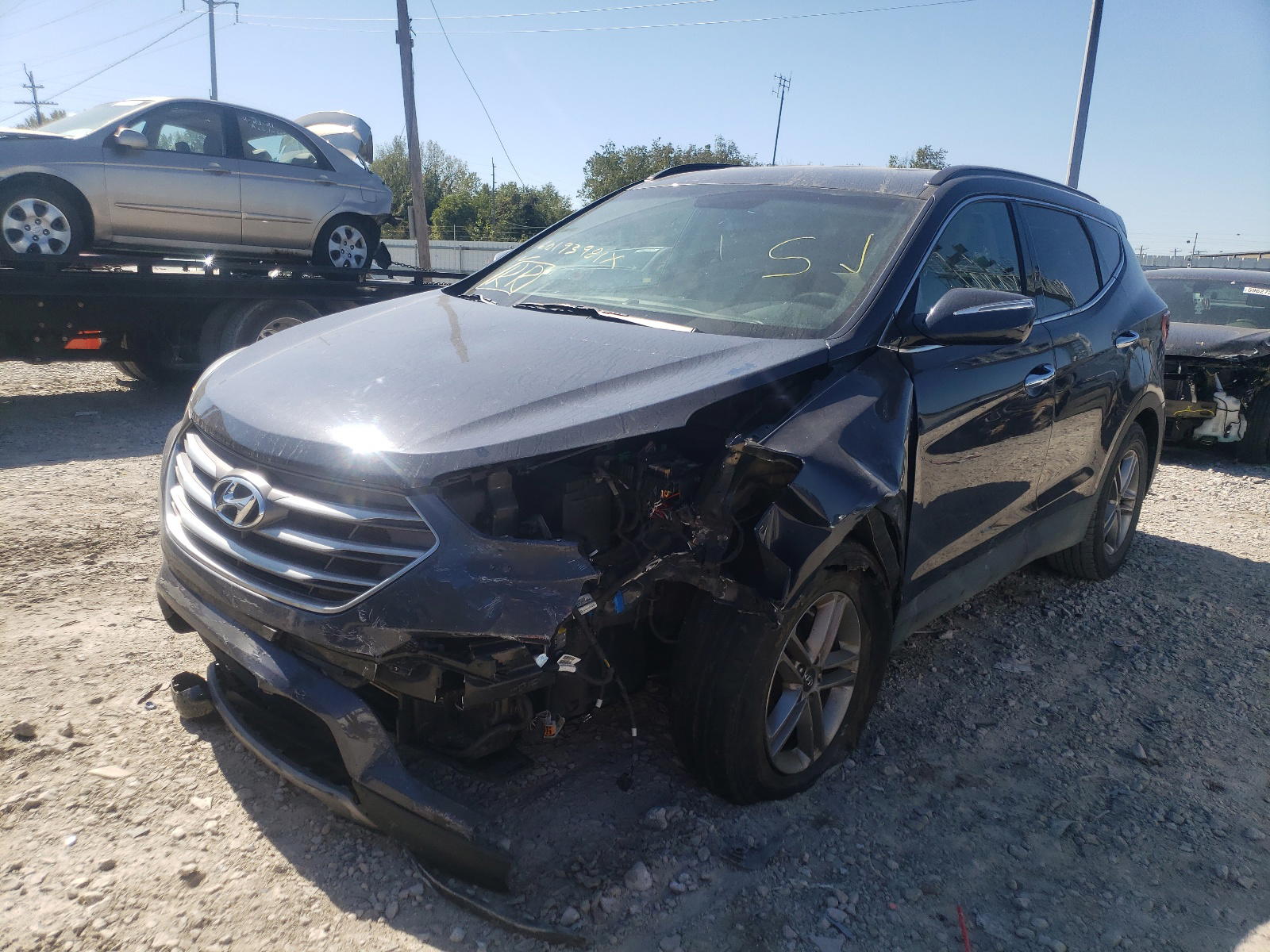 Photo 2 from auction – 2017 HYUNDAI SANTA FE S with VIN 5NMZU3LB2HH049917