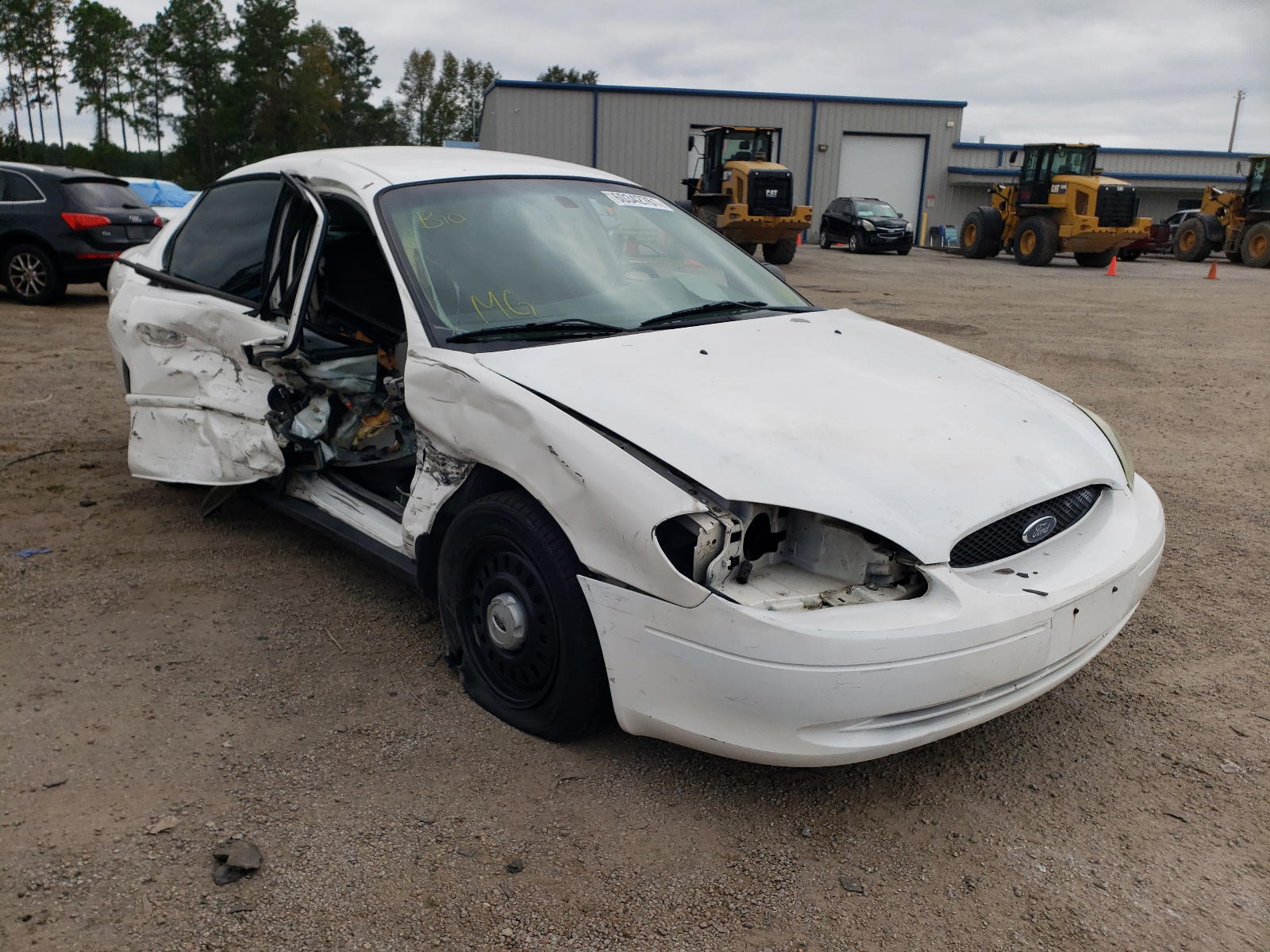 FORD TAURUS LX 2004 with VIN 1FAFP52204G179774 - Photo from auction