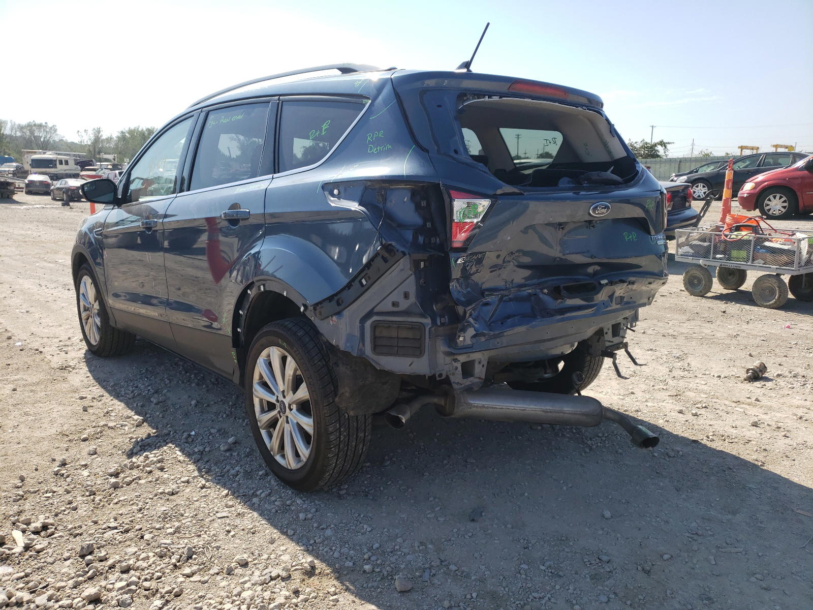 Photo 3 from auction – 2018 FORD ESCAPE TIT with VIN 1FMCU9J98JUB02428