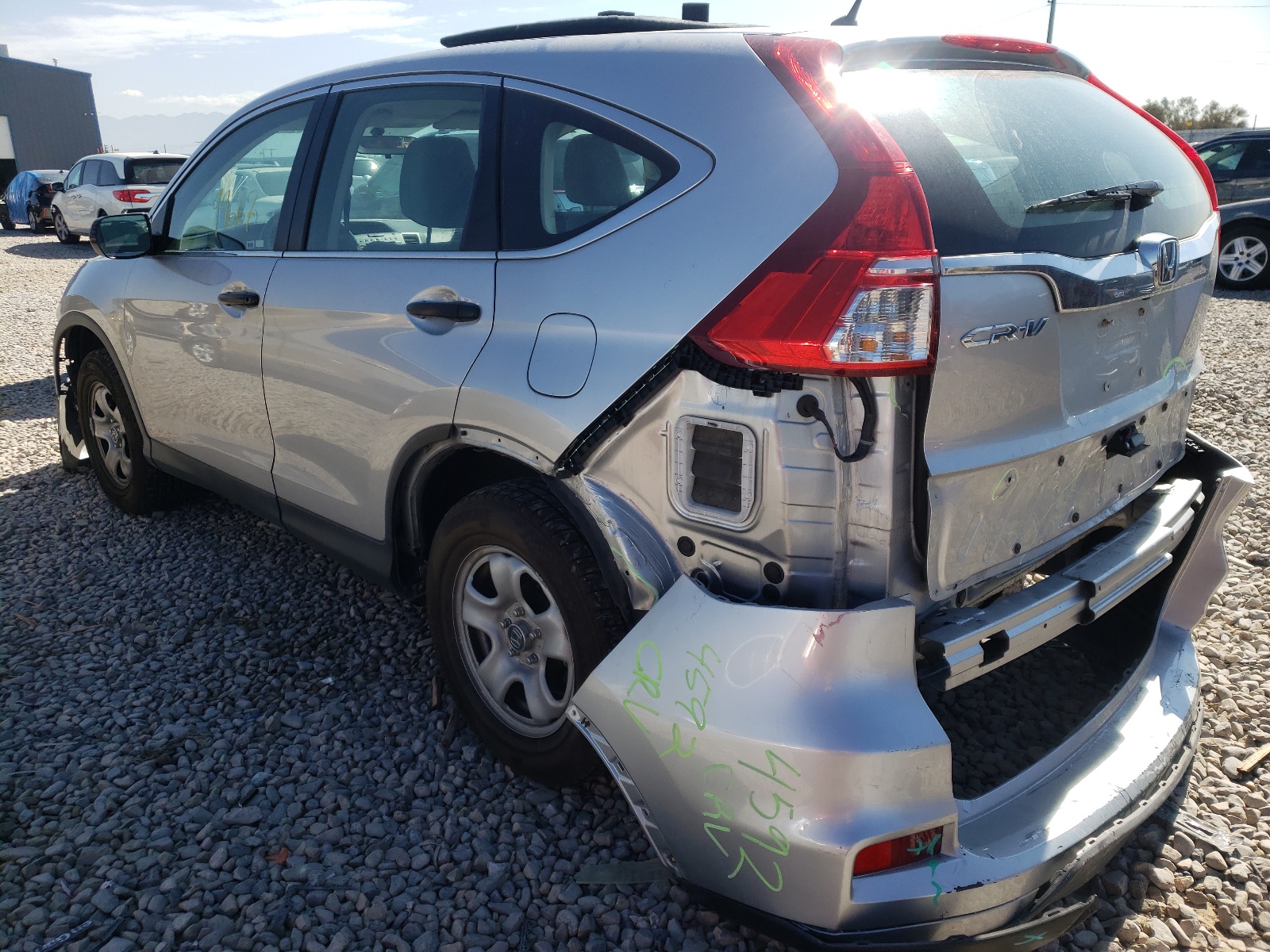 Photo 3 from auction – 2015 HONDA CR-V LX with VIN 3CZRM3H33FG703988
