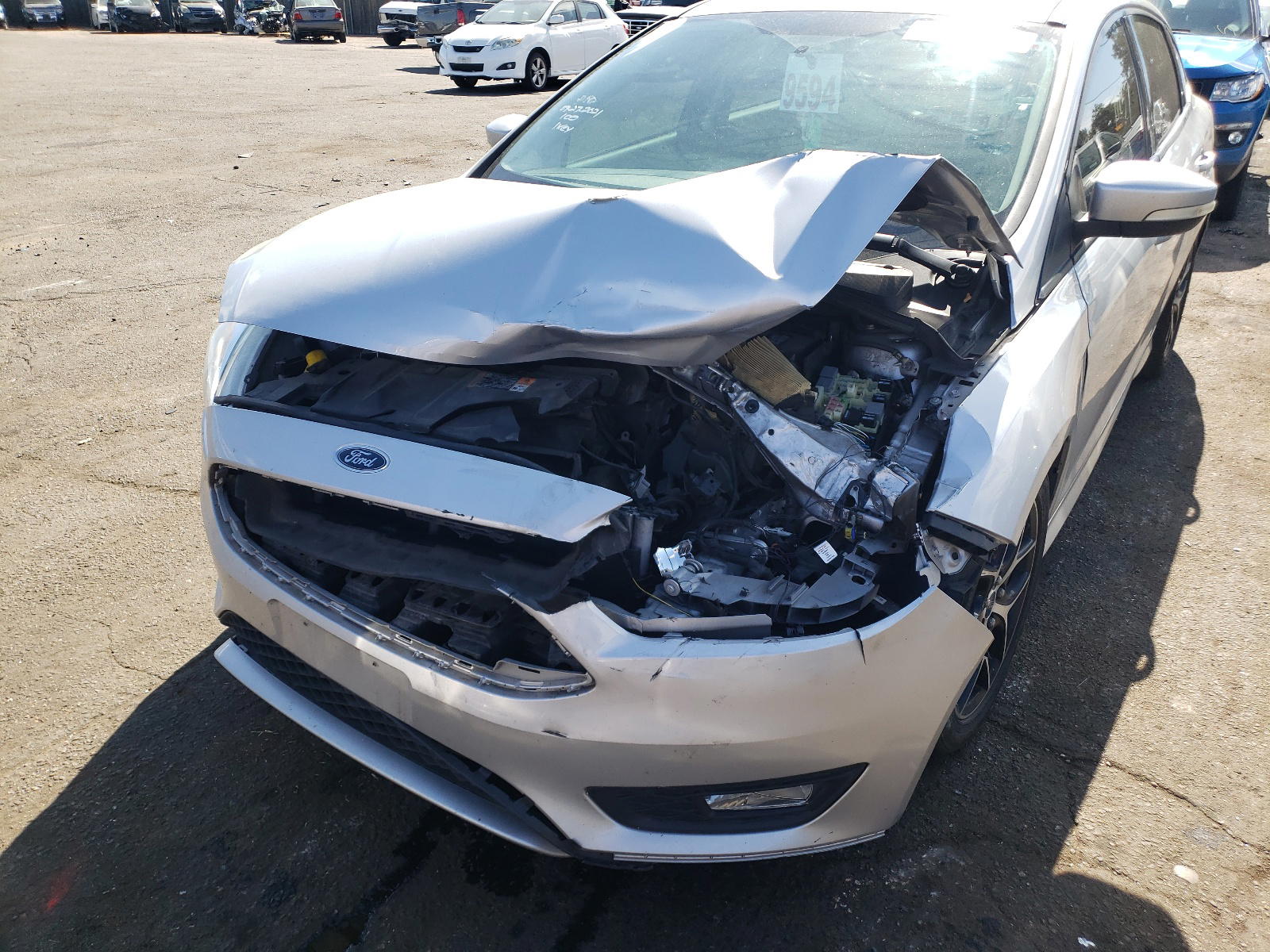 Photo 9 from auction – 2015 FORD FOCUS SE with VIN 1FADP3F29FL300043