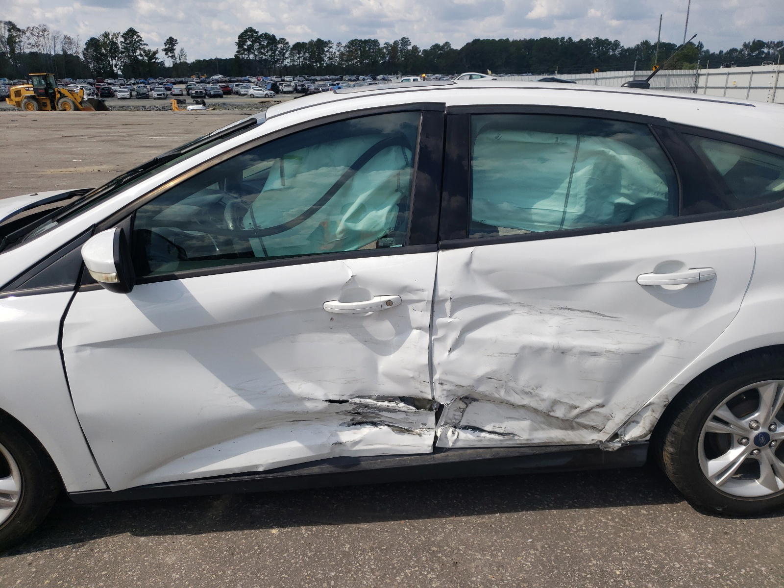Photo 10 from auction – 2014 FORD FOCUS SE with VIN 1FADP3K23EL225439