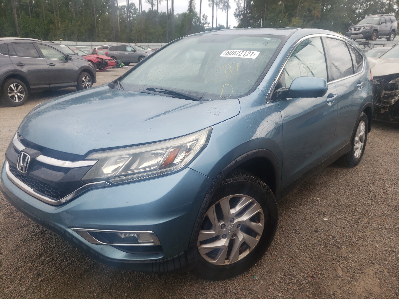 Photo 2 from auction – 2015 HONDA CR-V EX with VIN 2HKRM3H59FH524725