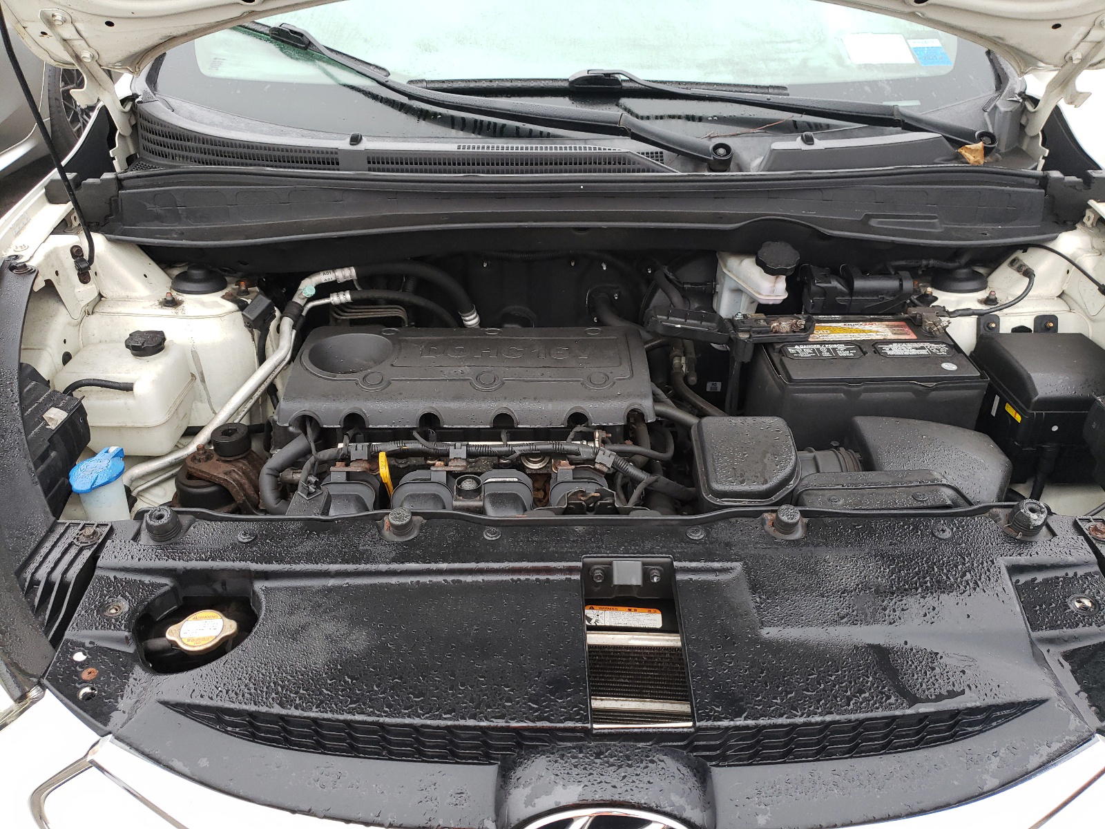 Photo 7 from auction – 2011 HYUNDAI TUCSON with VIN KM8JUCAC0AU023044