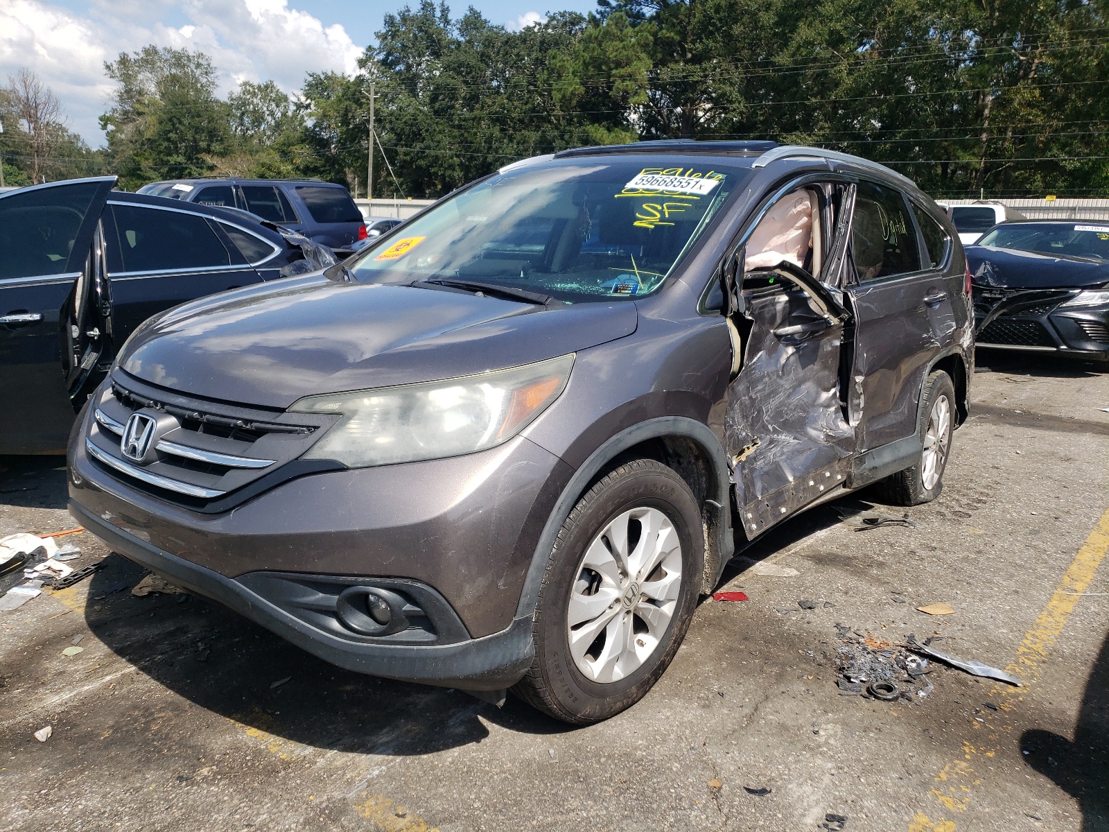 Photo 2 from auction – 2012 HONDA CR-V EXL with VIN 5J6RM3H74CL031148