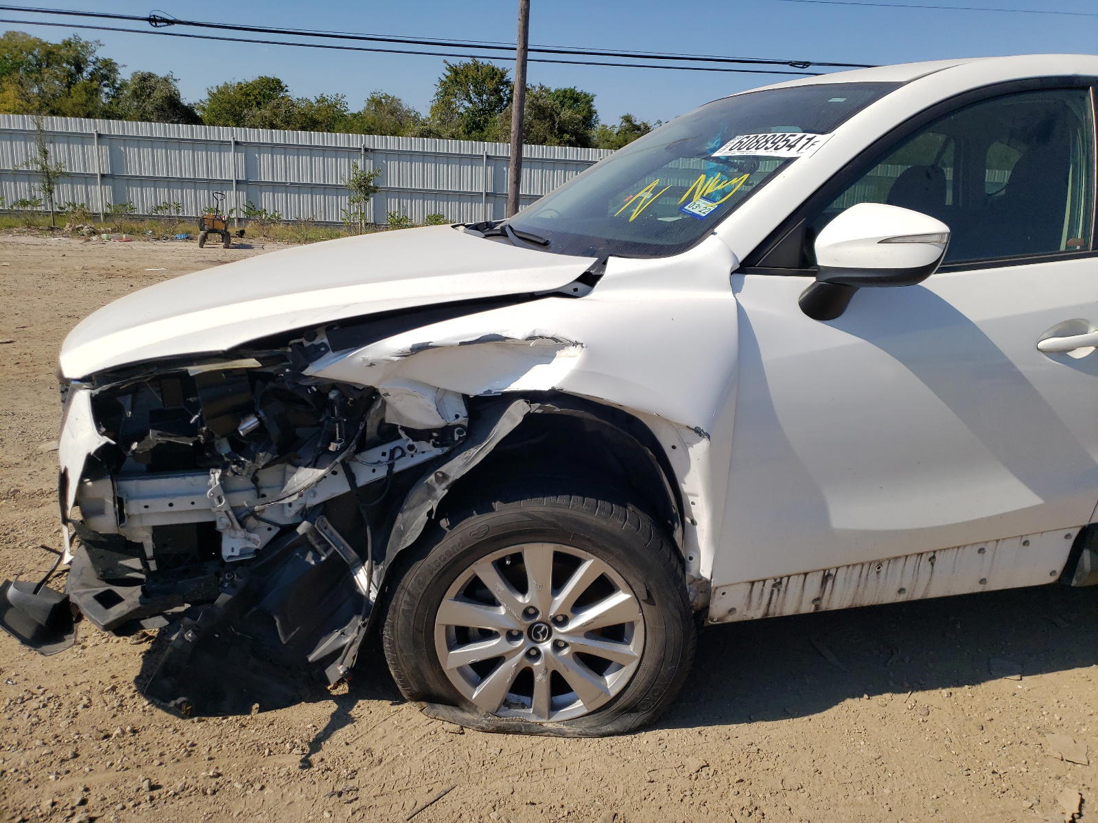 Photo 9 from auction – 2015 MAZDA CX-5 TOURI with VIN JM3KE2CY0F0469211