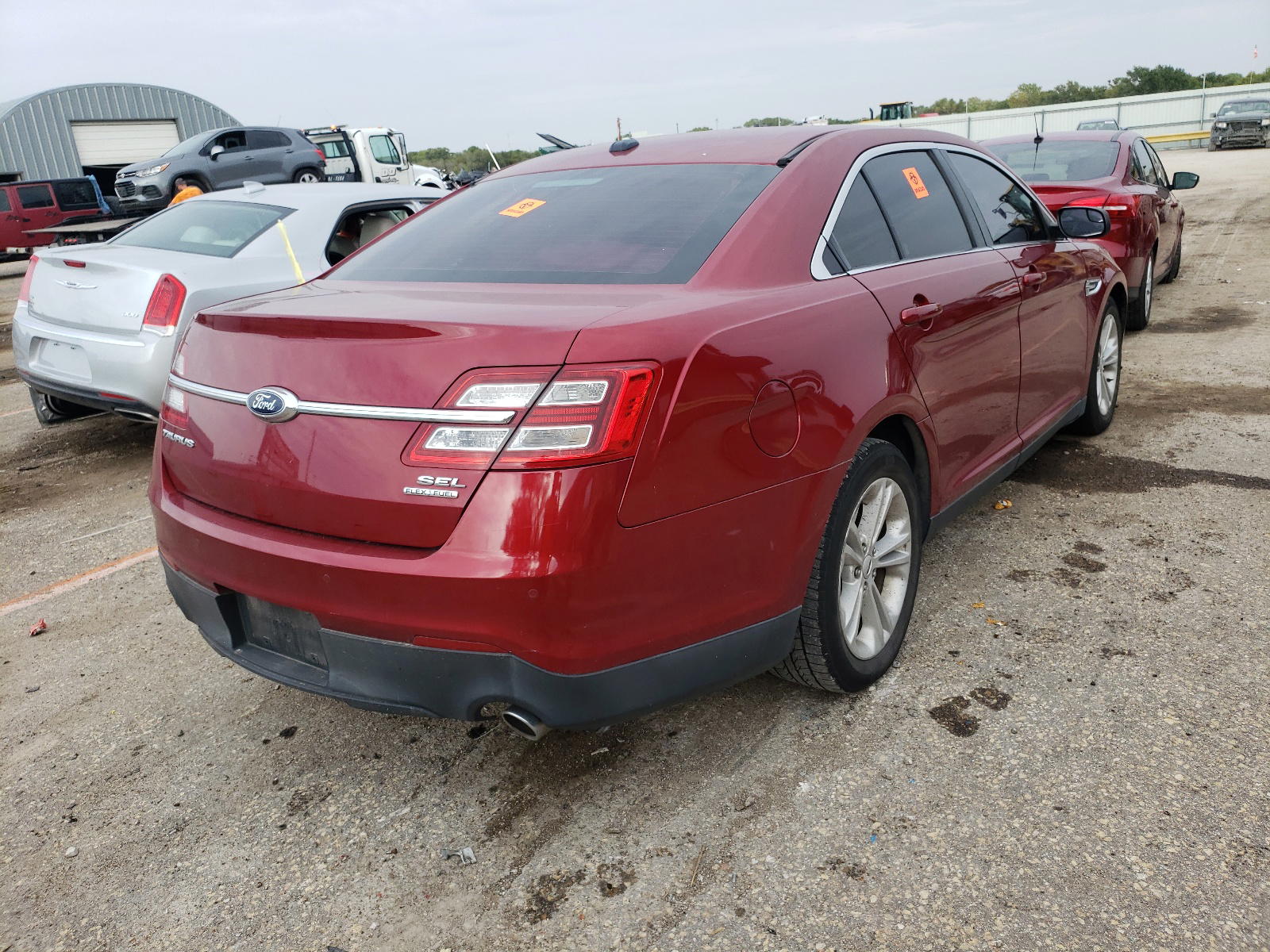 Photo 4 from auction – 2014 FORD TAURUS SEL with VIN 1FAHP2E80EG185003