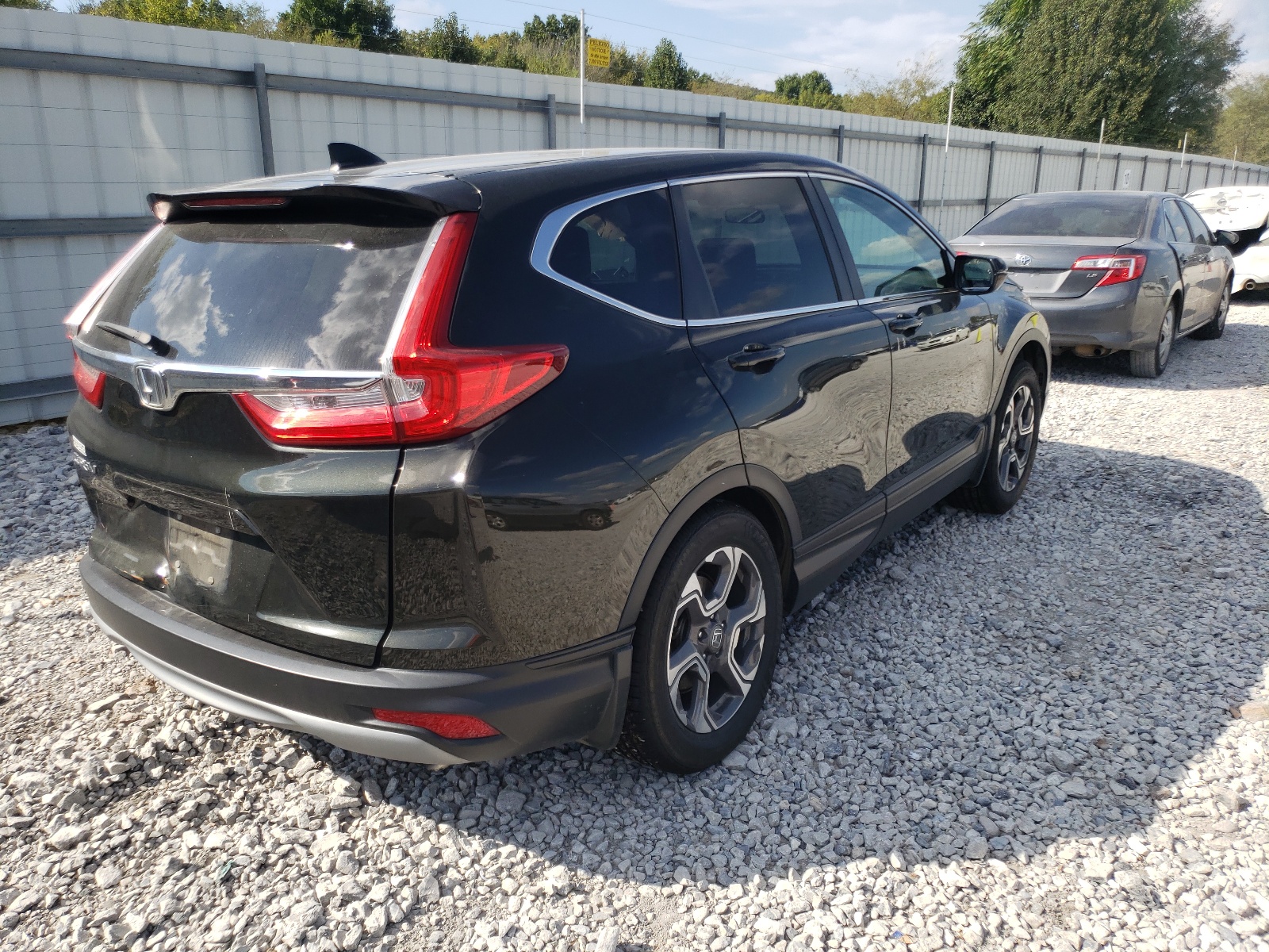 Photo 4 from auction – 2018 HONDA CR-V EX with VIN 7FARW1H54JE005690