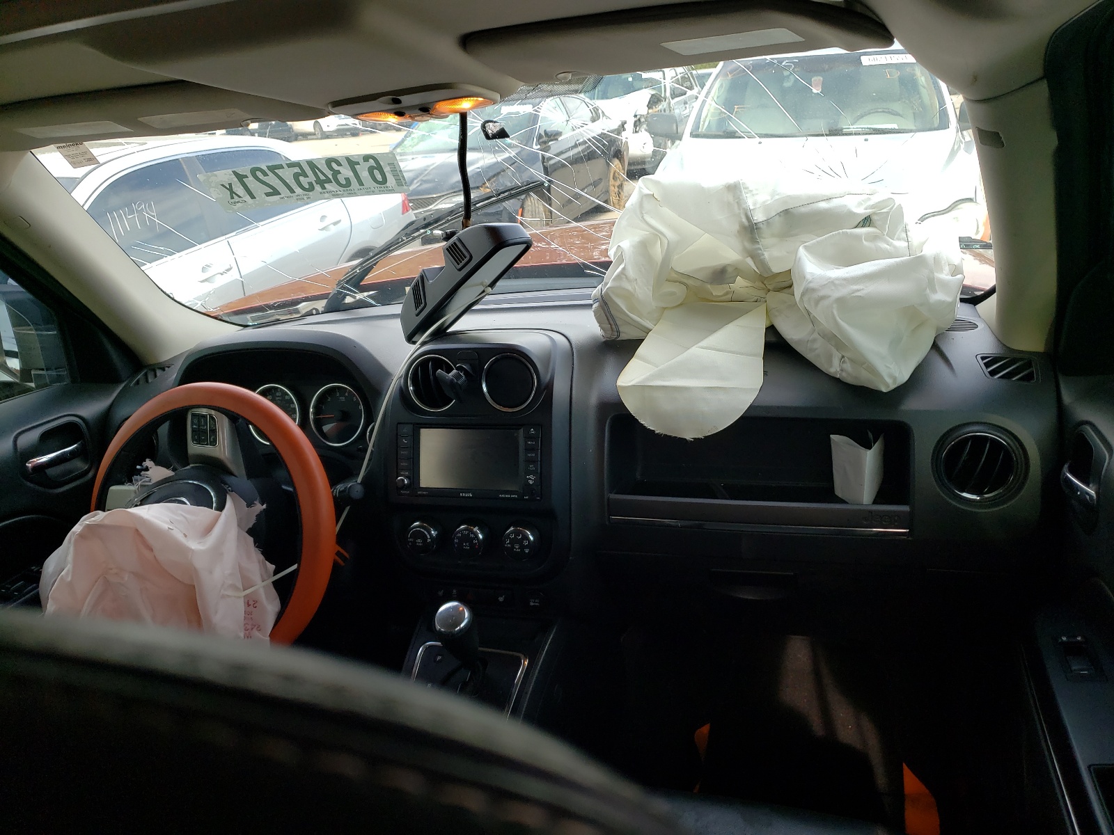 Photo 5 from auction – 2012 JEEP PATRIOT LI with VIN 1C4NJRCB8CD594970
