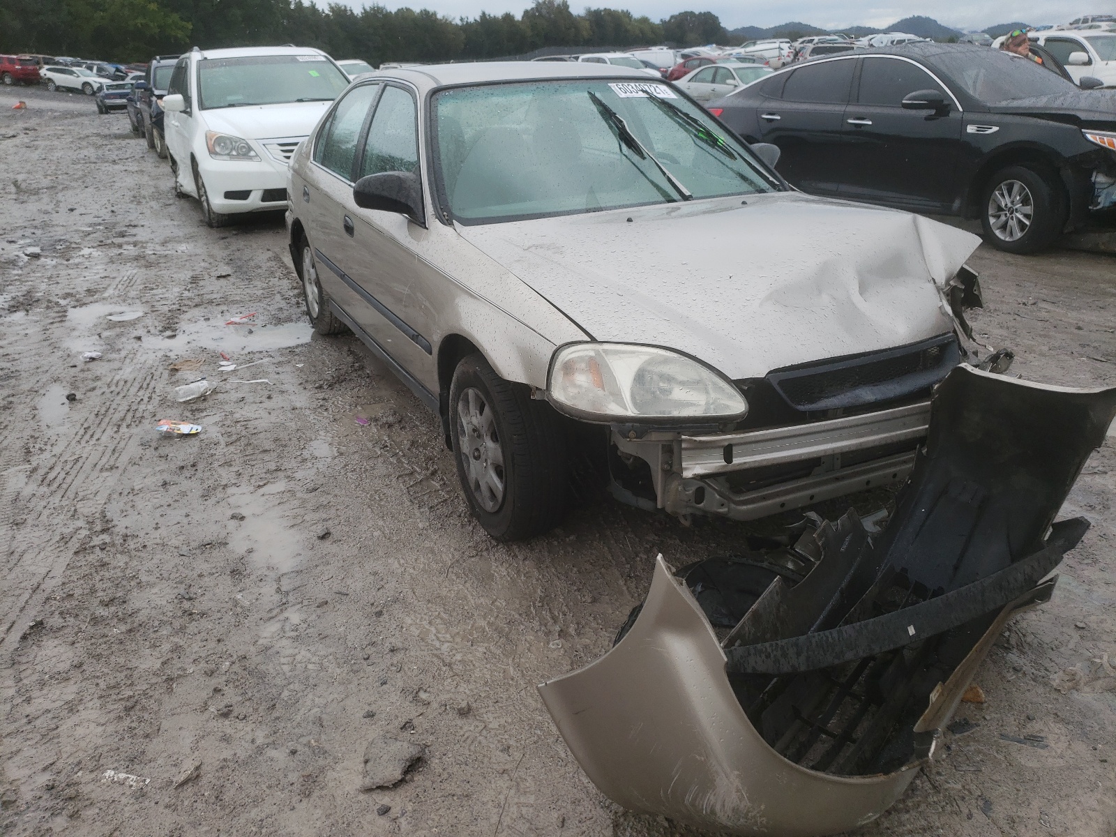 Photo 1 from auction – 2000 HONDA CIVIC LX with VIN 1HGEJ6676YL010490