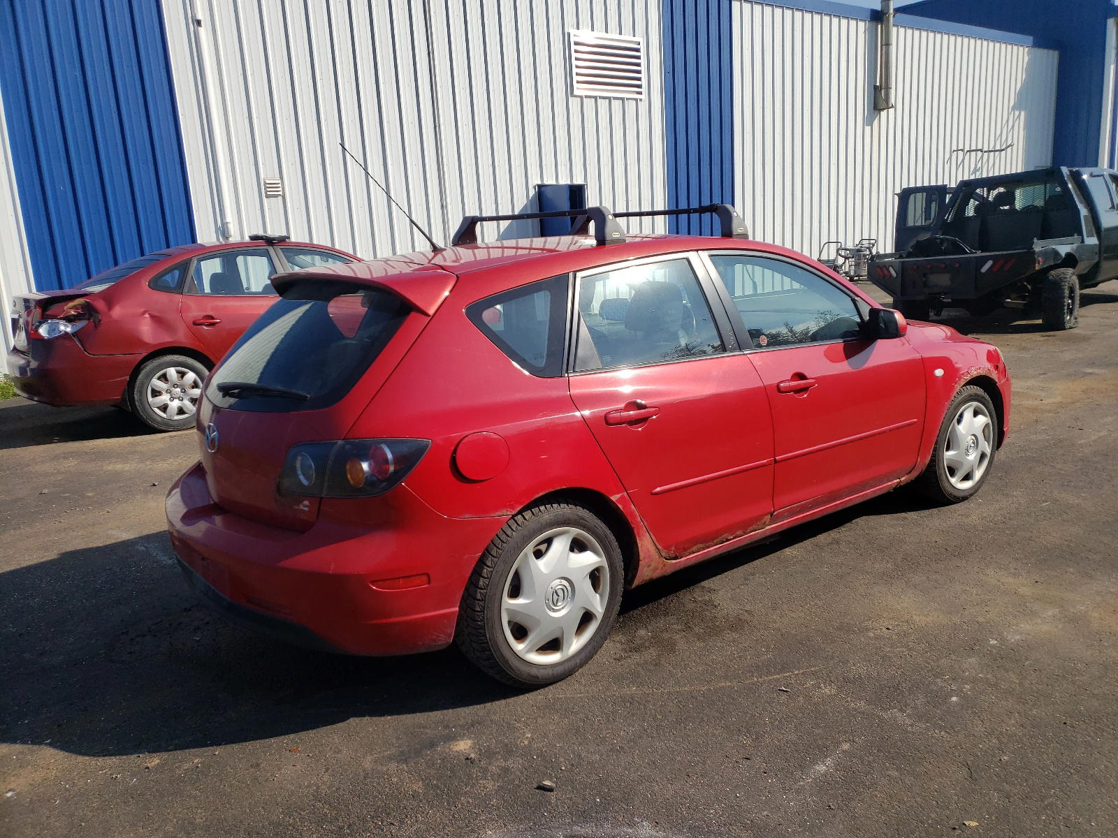 Photo 4 from auction – 2005 MAZDA 3 HATCHBAC with VIN JM1BK143151285869