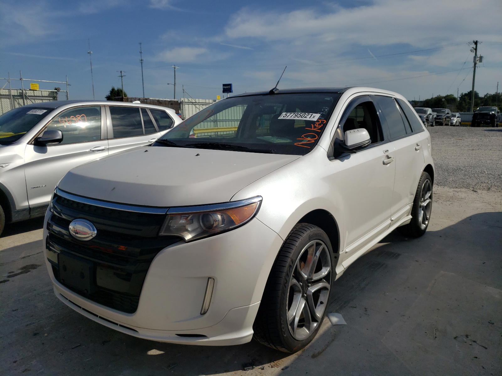 Photo 2 from auction – 2014 FORD EDGE SPORT with VIN 2FMDK4AK0EBA23833