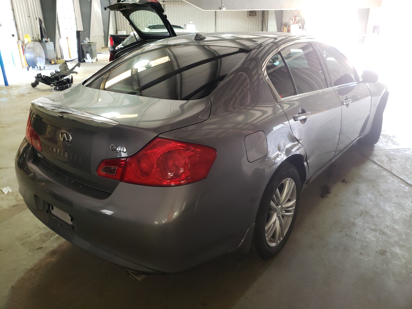 Photo 4 from auction – 2015 INFINITI Q40 with VIN JN1CV6AR6FM650325