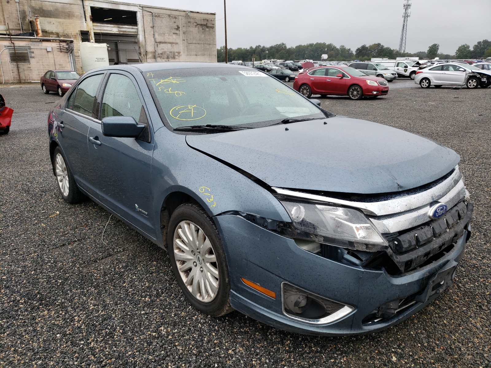 FORD FUSION HYB 2011 with VIN 3FADP0L33BR272215 - Photo from auction