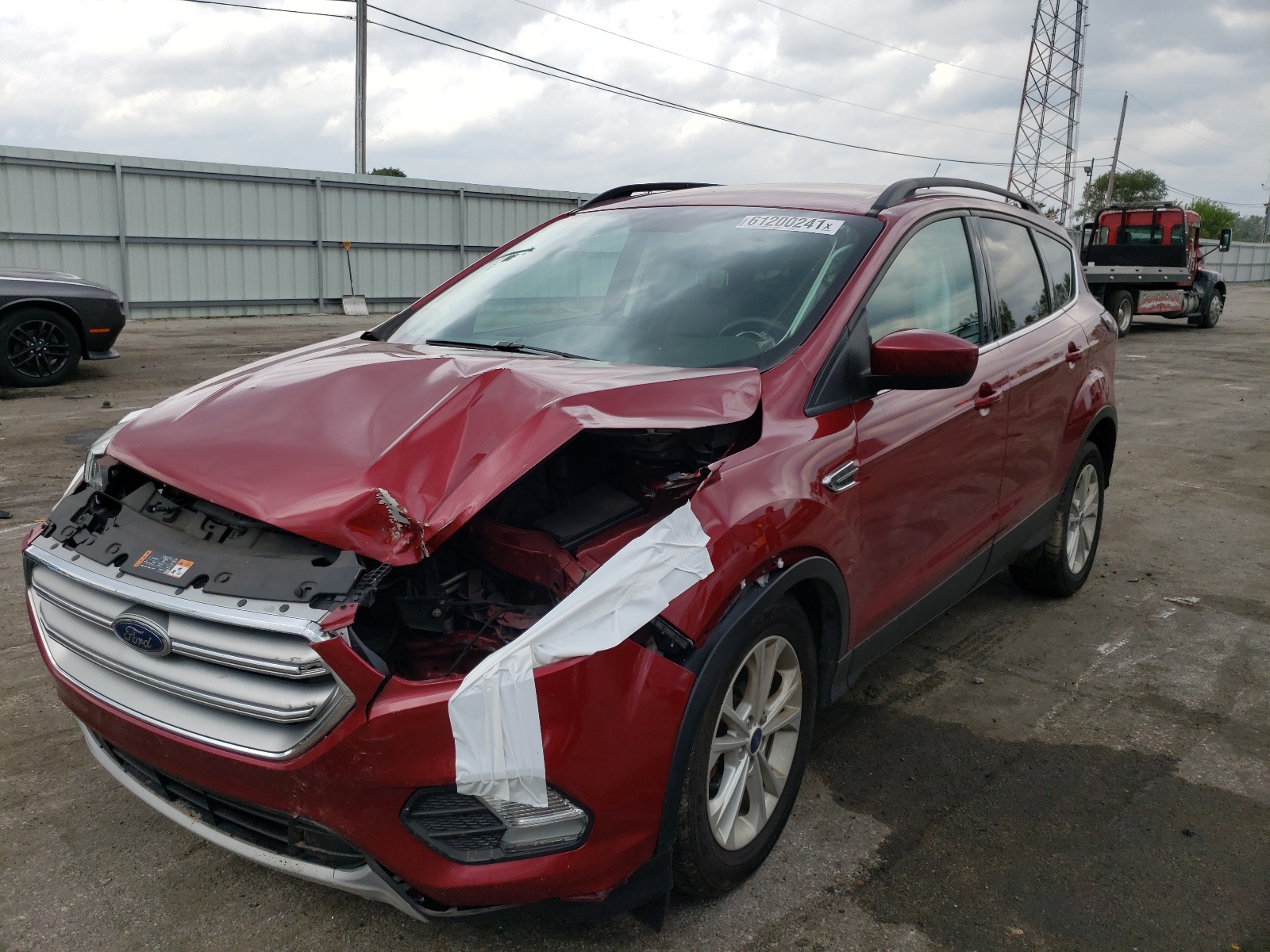 Photo 2 from auction – 2017 FORD ESCAPE SE with VIN 1FMCU9GD1HUA16156