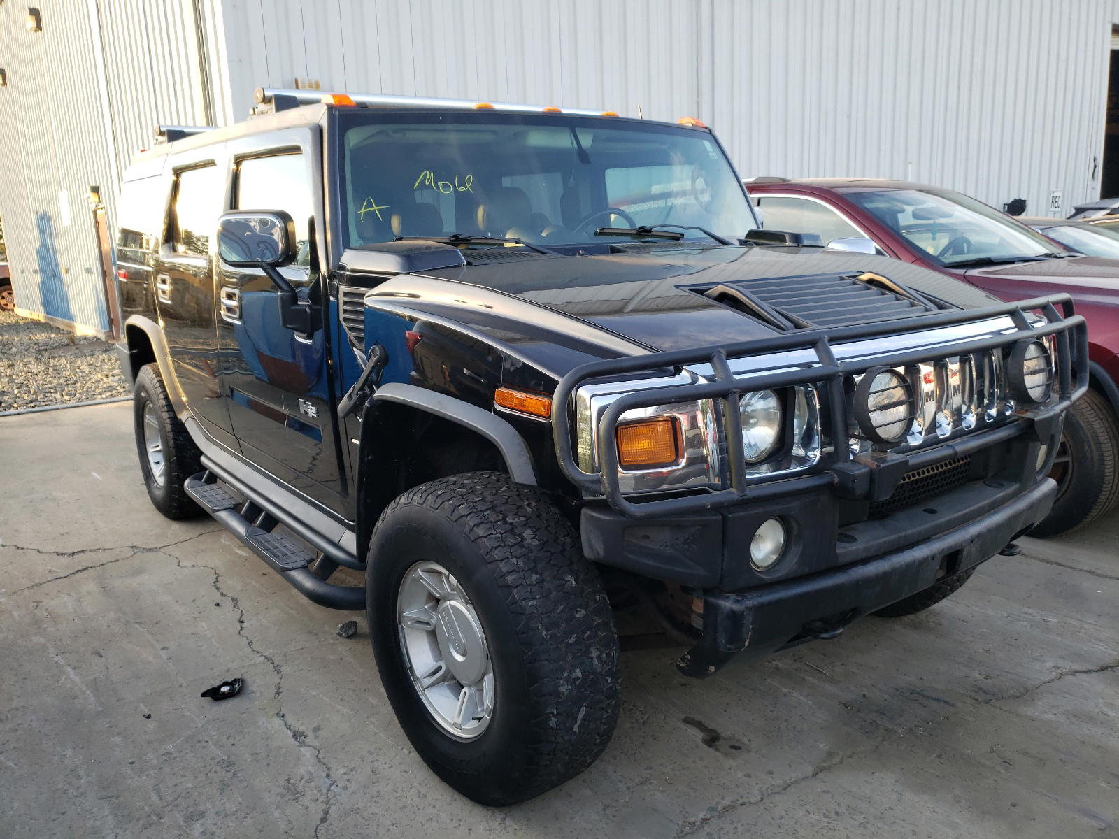 HUMMER H2 2003 with VIN 5GRGN23U23H126780 - Photo from auction