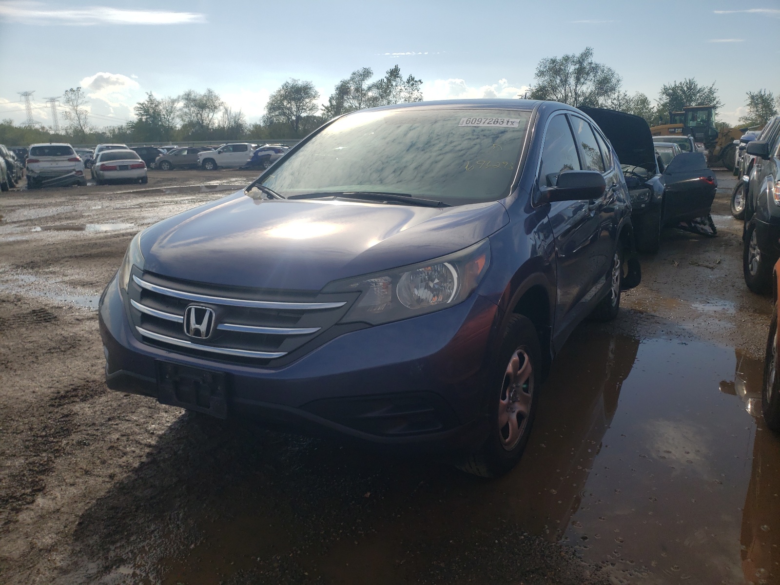 Photo 2 from auction – 2014 HONDA CR-V LX with VIN 2HKRM4H36EH696293