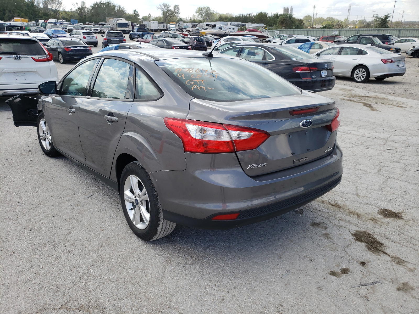 Photo 3 from auction – 2013 FORD FOCUS SE with VIN 1FADP3F20DL352223