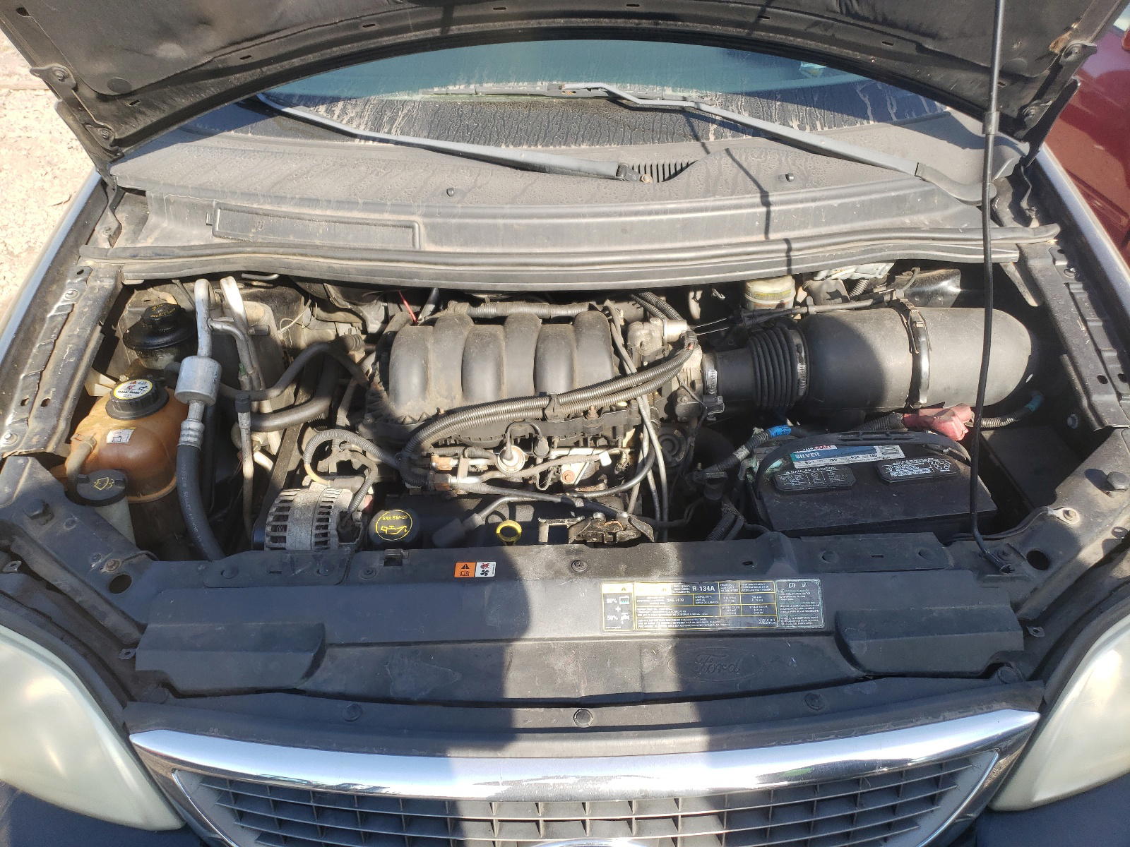 Photo 7 from auction – 2002 FORD WINDSTAR L with VIN 2FMDA58452BB83976