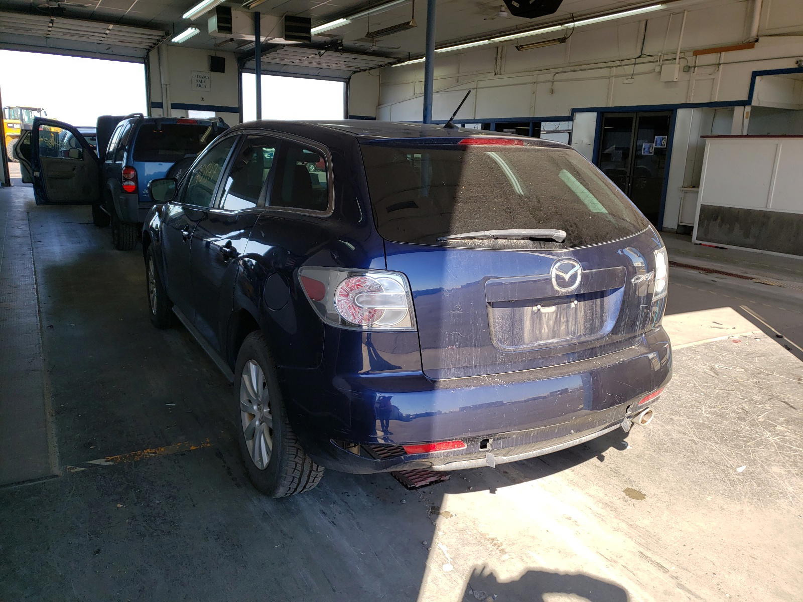 Photo 3 from auction – 2011 MAZDA CX-7 with VIN JM3ER2B50B0359875
