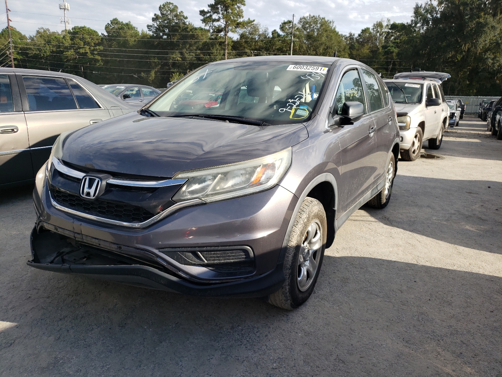 Photo 2 from auction – 2015 HONDA CR-V LX with VIN 3CZRM3H30FG704340