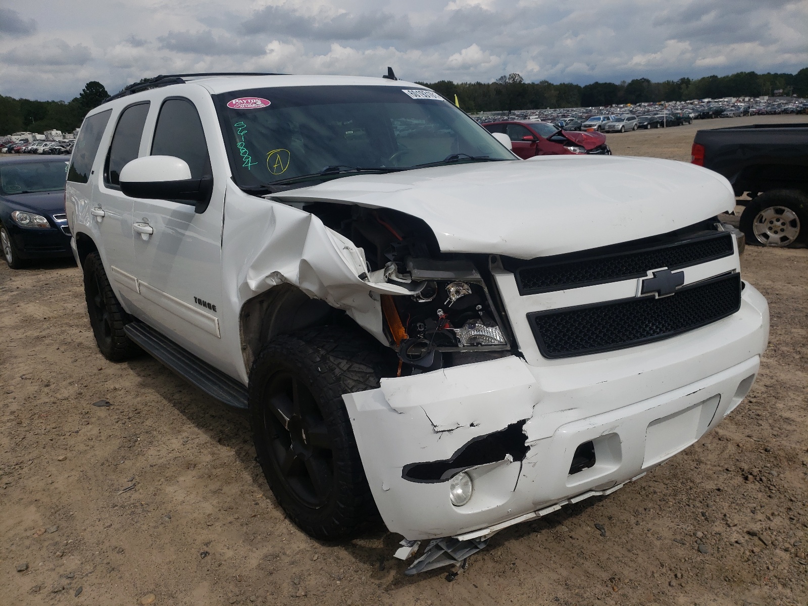 CHEVROLET TAHOE C150 2011 with VIN 1GNSCBE02BR175568 - Photo from auction