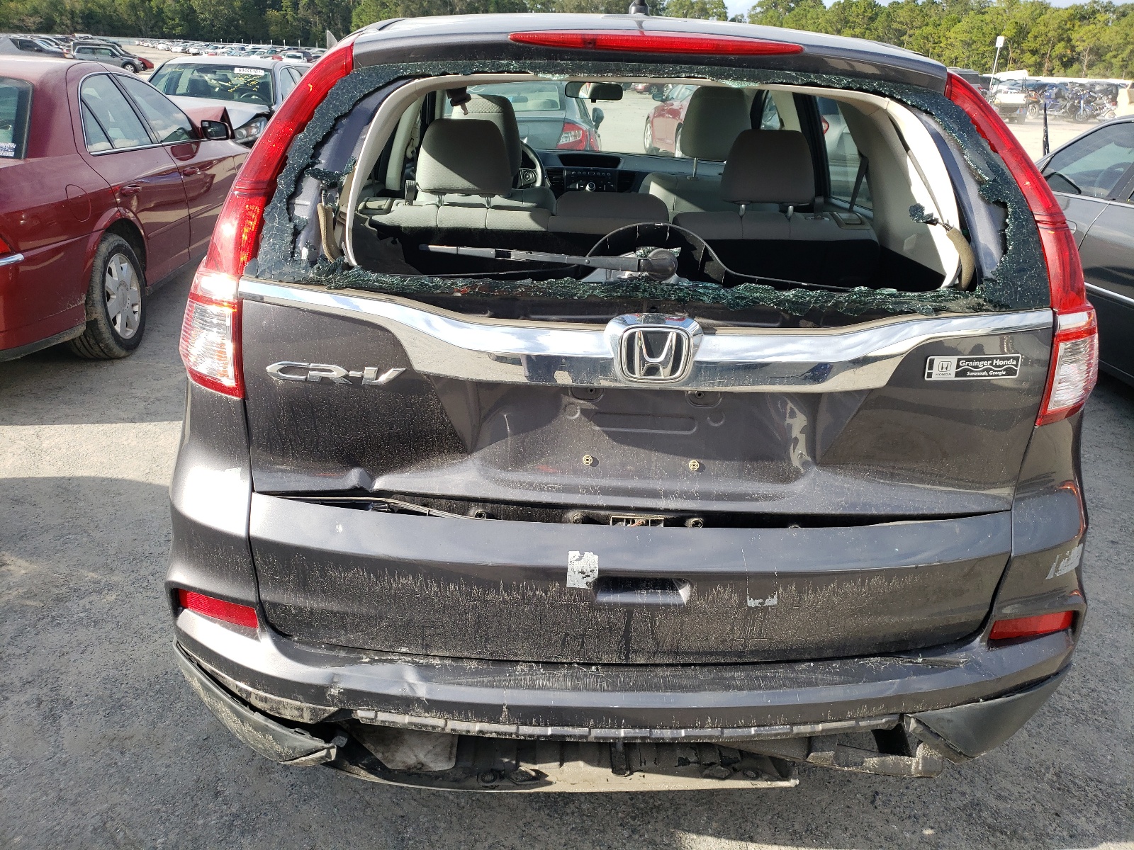 Photo 9 from auction – 2015 HONDA CR-V LX with VIN 3CZRM3H30FG704340