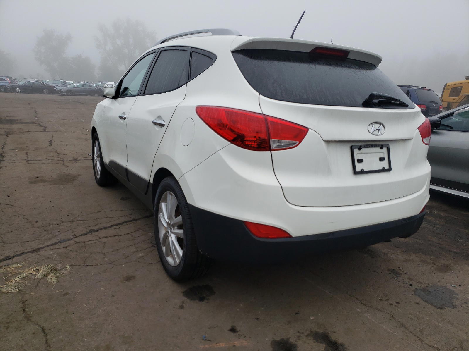 Photo 3 from auction – 2011 HYUNDAI TUCSON with VIN KM8JUCAC0AU023044