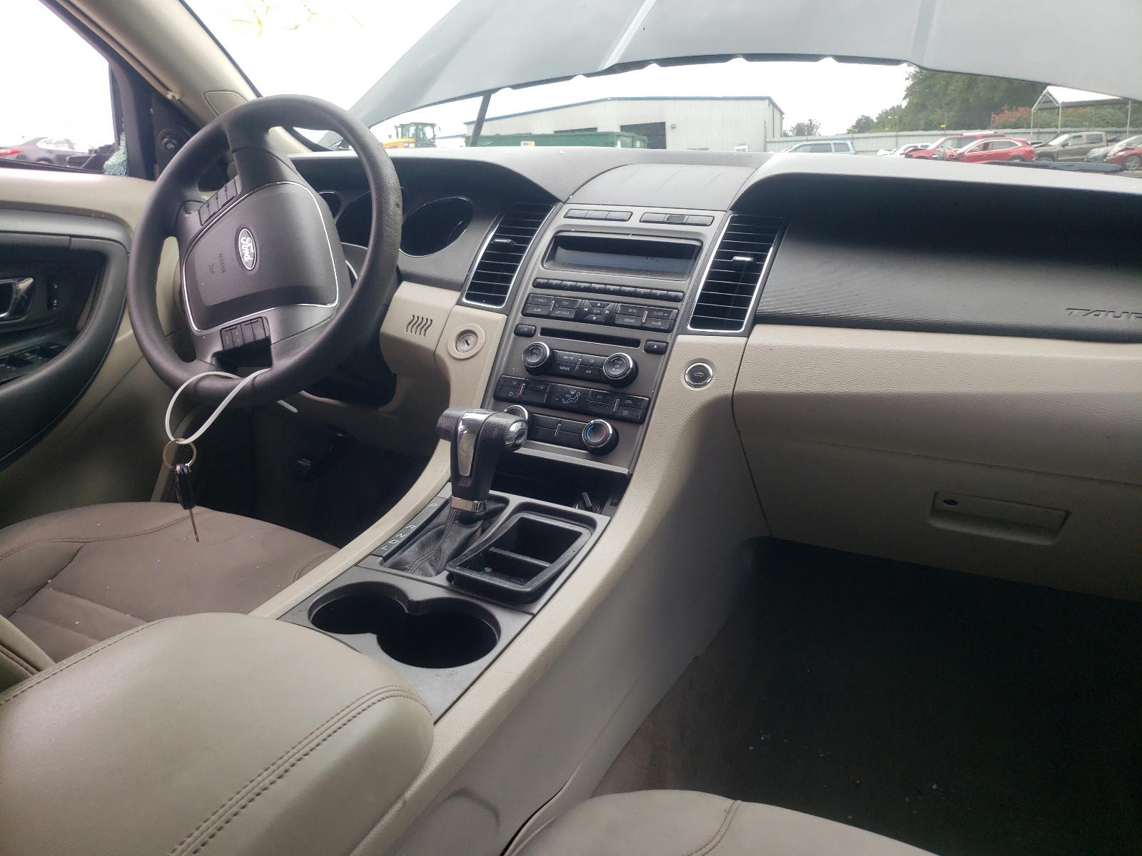Photo 9 from auction – 2011 FORD TAURUS SE with VIN 1FAHP2DW8BG161236