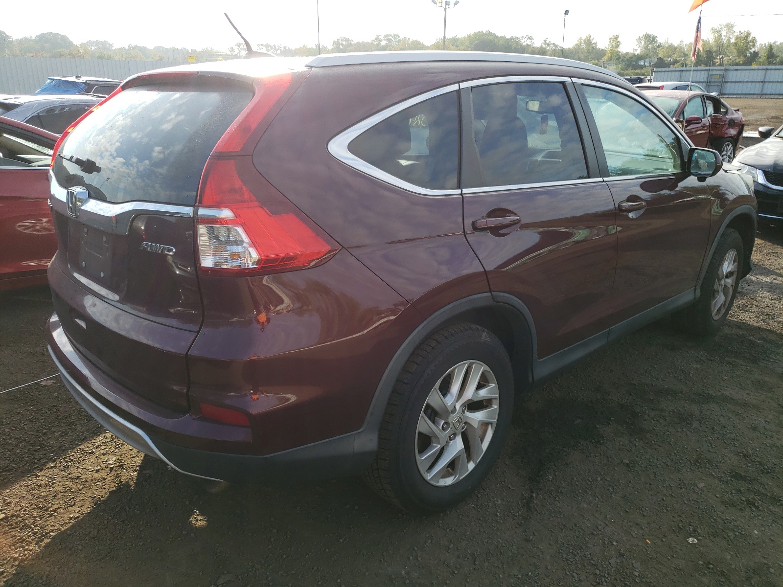 Photo 4 from auction – 2016 HONDA CR-V EXL with VIN 5J6RM4H77GL032791