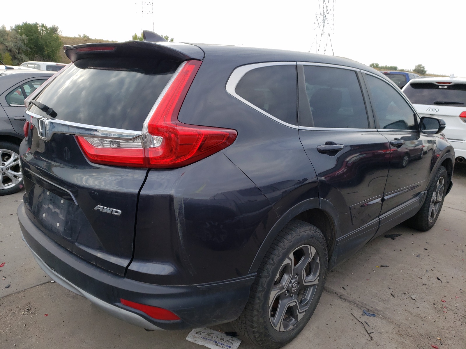 Photo 4 from auction – 2017 HONDA CR-V EX with VIN 2HKRW2H57HH664408