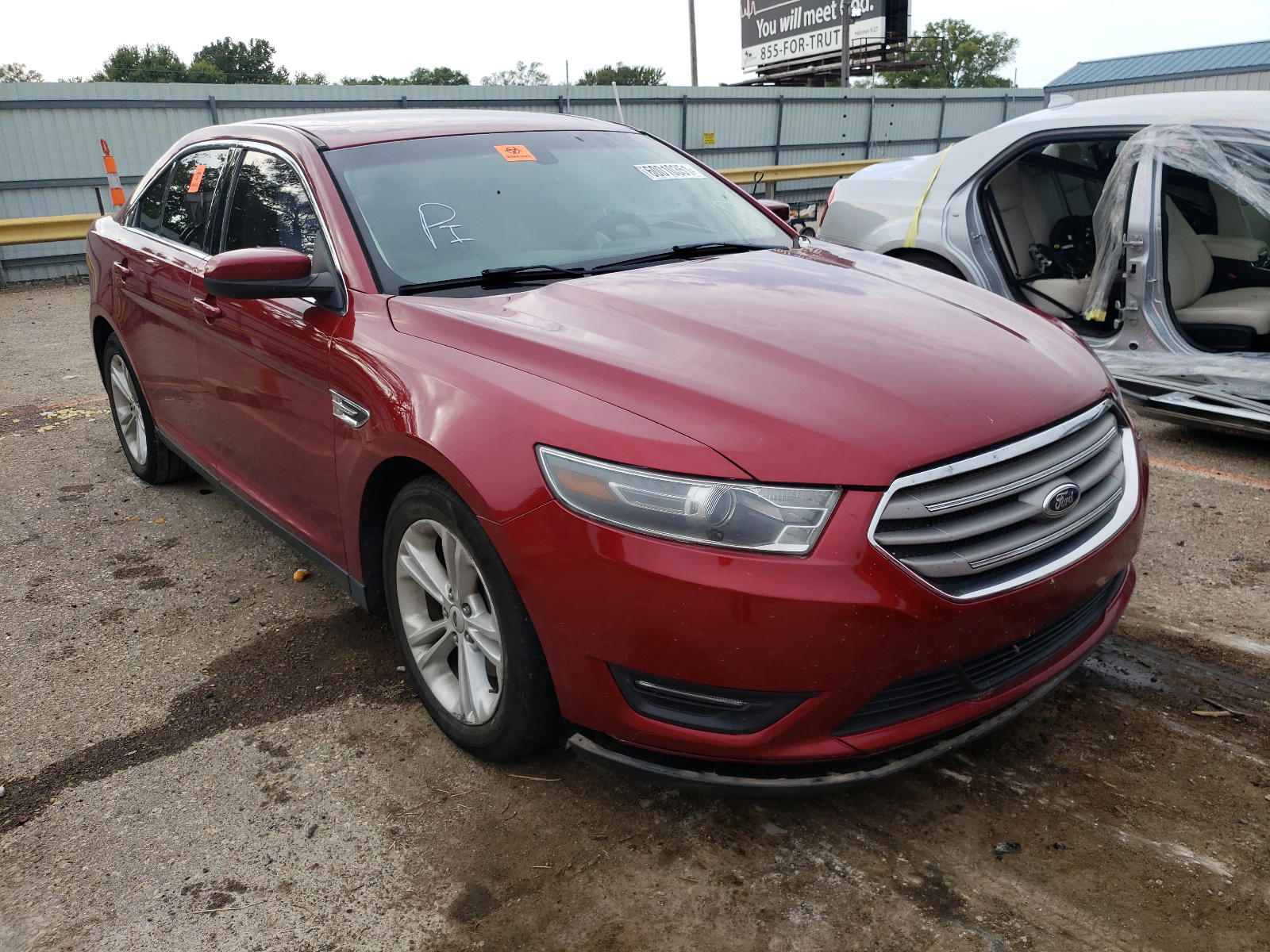 FORD TAURUS SEL 2014 with VIN 1FAHP2E80EG185003 - Photo from auction