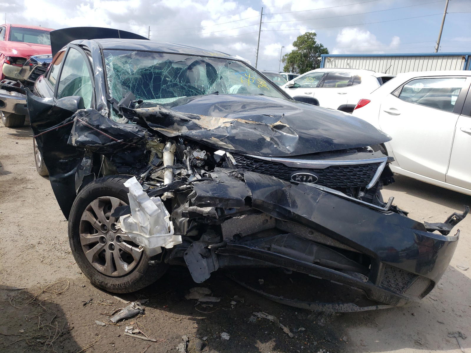 KIA FORTE EX 2013 with VIN KNAFU4A27D5703770 - Photo from auction