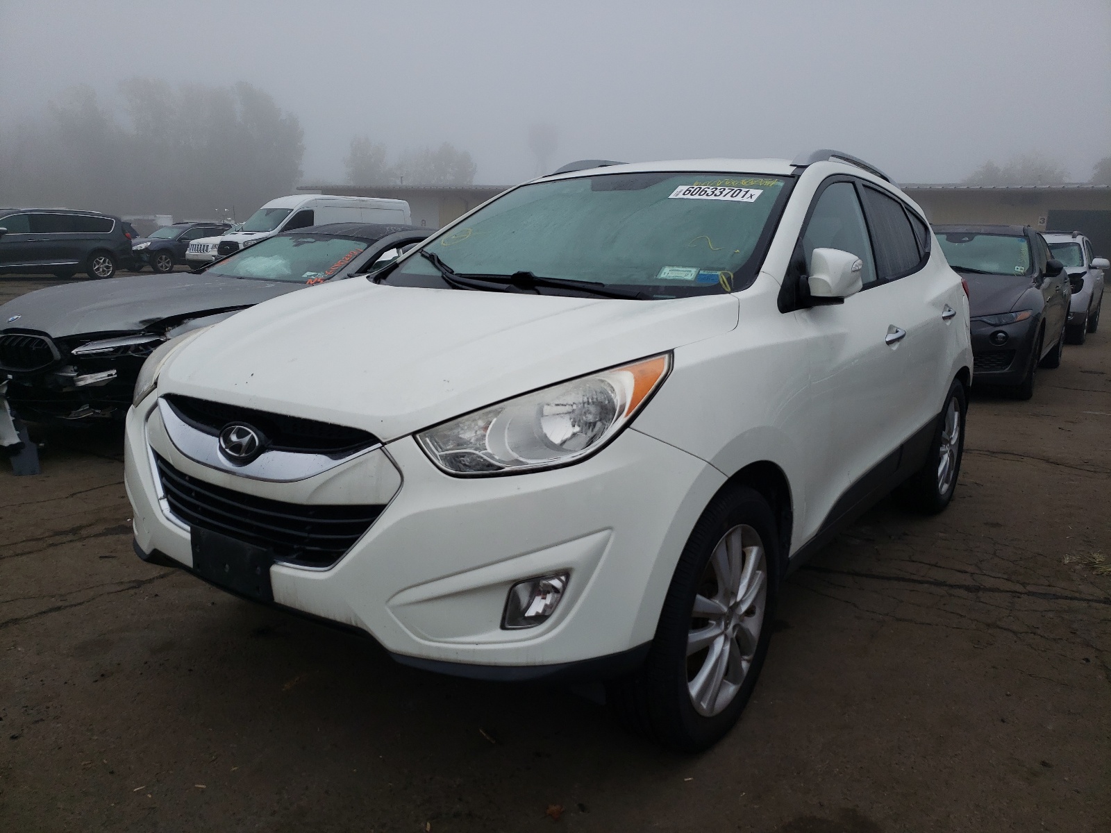 Zdjęcie 2 z aukcji – 2011 HYUNDAI TUCSON z VIN KM8JUCAC0AU023044