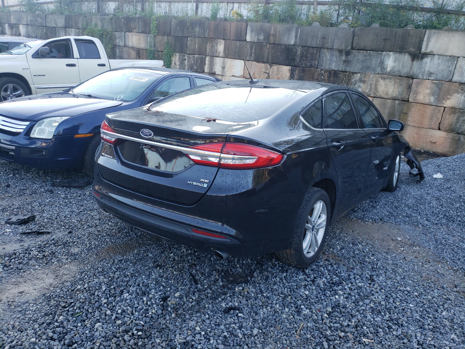 Photo 4 from auction – 2018 FORD FUSION S with VIN 3FA6P0LU1JR140294