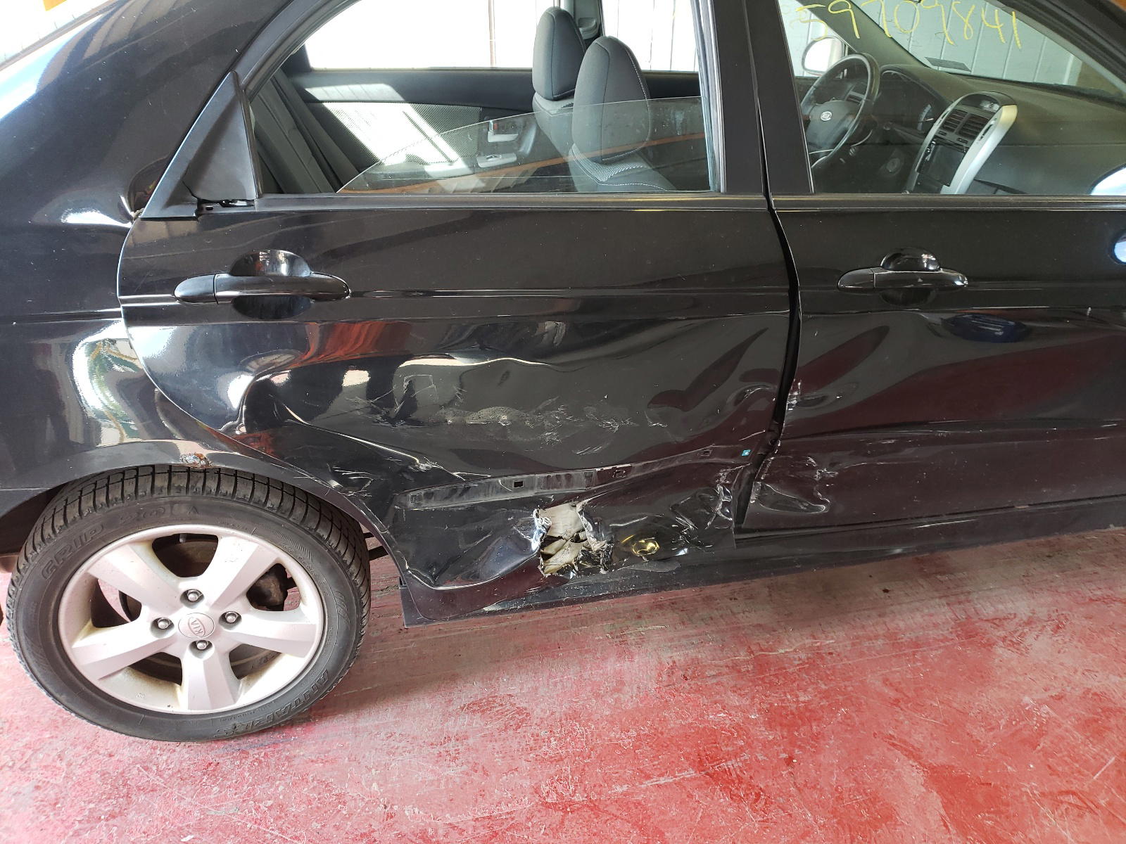 Photo 9 from auction – 2009 KIA SPECTRA EX with VIN KNAFE222495024496