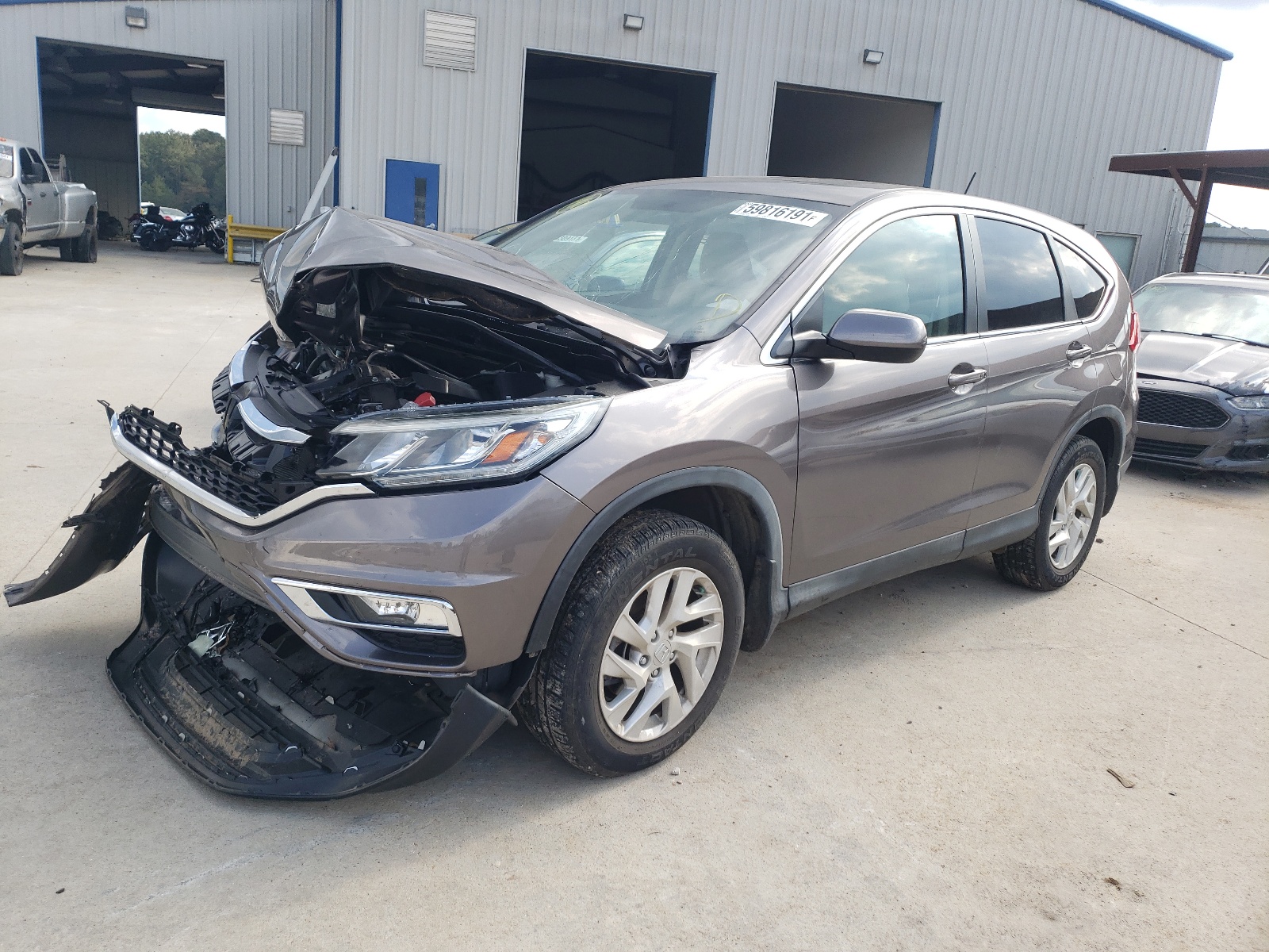Photo 2 from auction – 2016 HONDA CR-V EX with VIN 3CZRM3H55GG715529