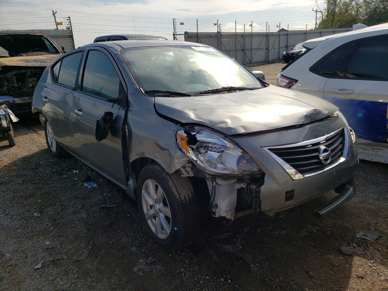 NISSAN VERSA S 2014 with VIN 3N1CN7AP3EL830522 - Photo from auction