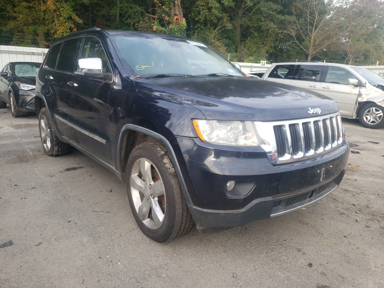 JEEP GRAND CHER 2011 with VIN 1J4RR5GT1BC603089 - Photo from auction