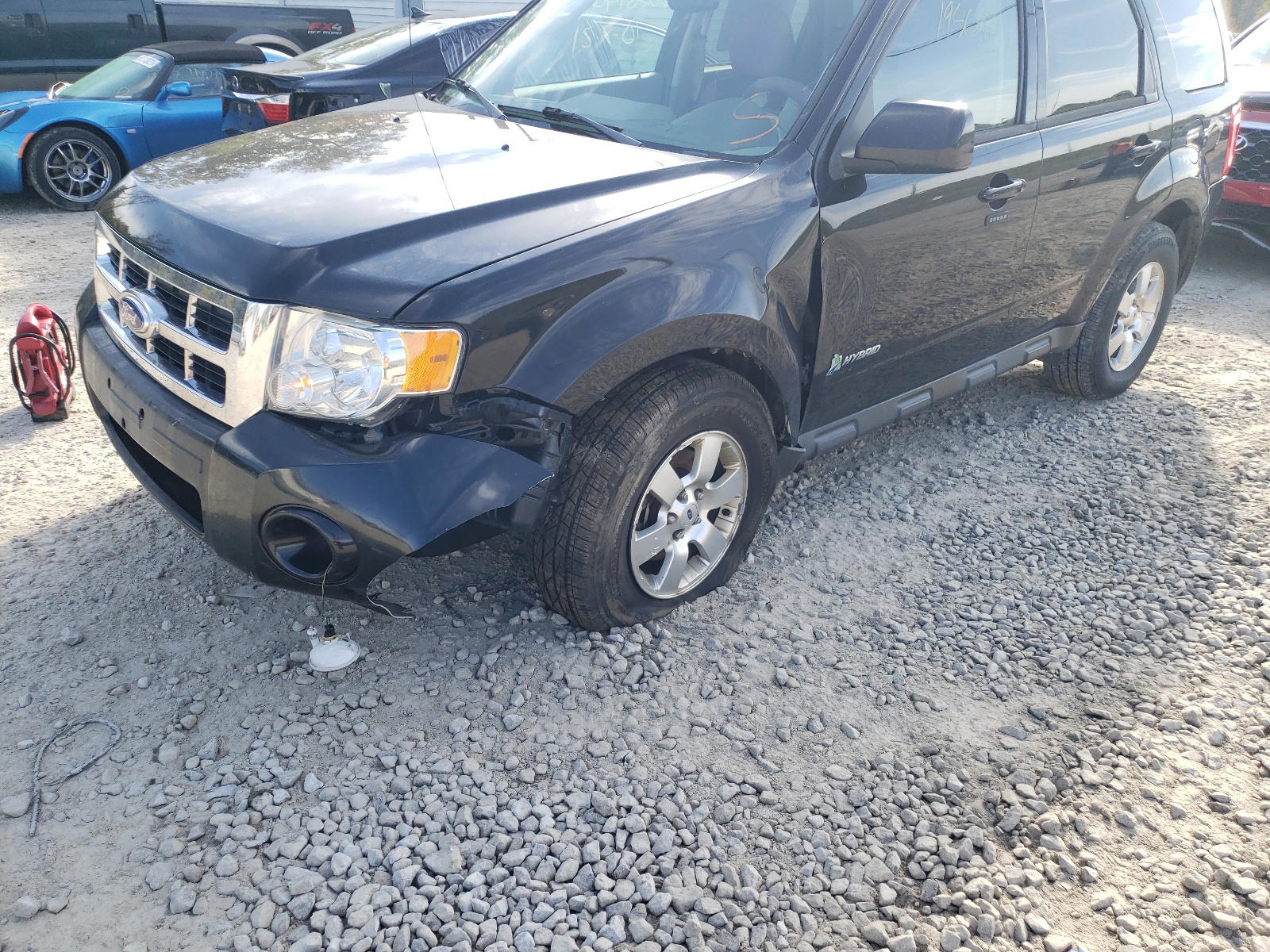 Photo 9 from auction – 2011 FORD ESCAPE HYB with VIN 1FMCU4K31BKC02512