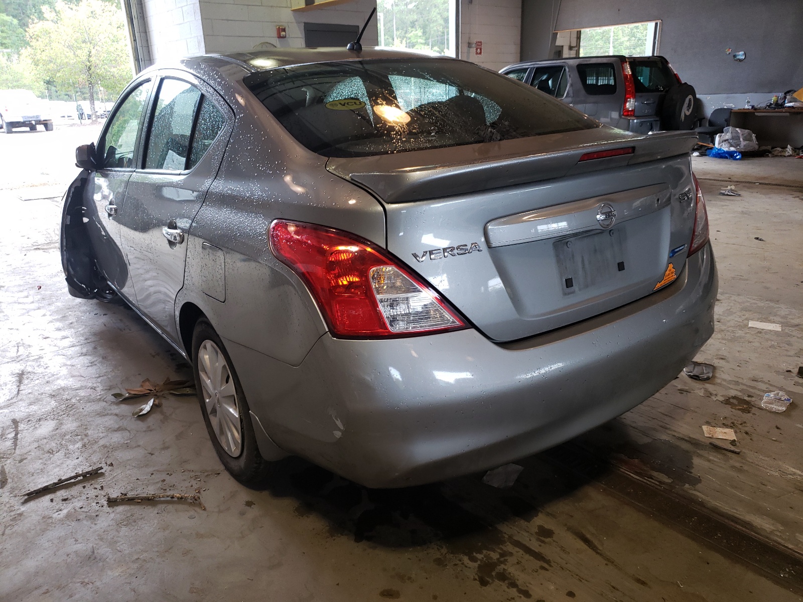 Photo 3 from auction – 2013 NISSAN VERSA S with VIN 3N1CN7AP3DL836772