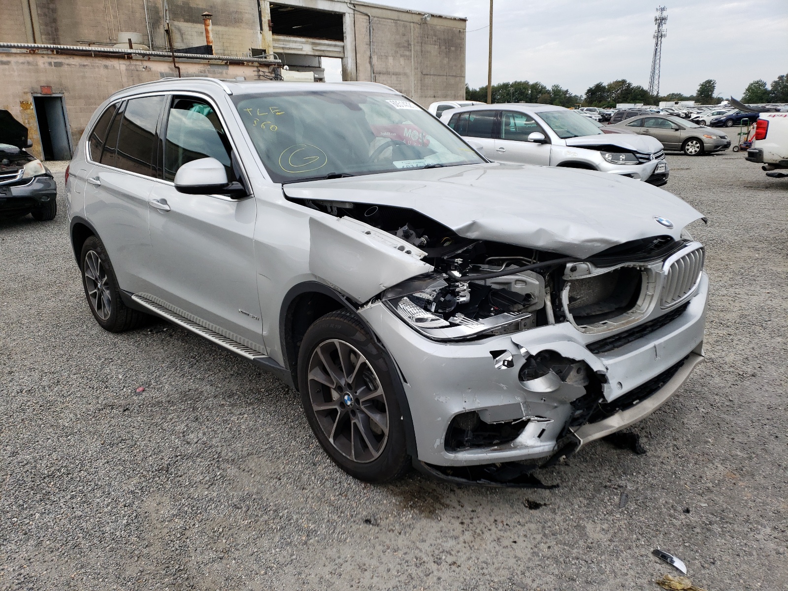 BMW X5 XDRIVE5 2014 with VIN 5UXKR6C59E0J72042 - Photo from auction