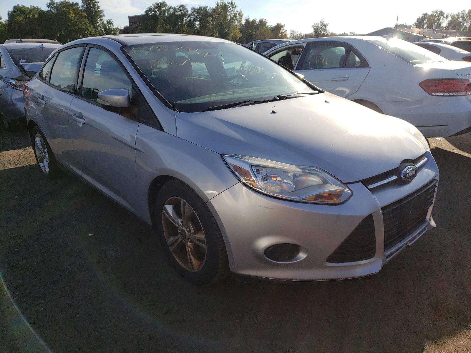 FORD FOCUS SE 2014 with VIN 1FADP3F20EL150497 - Photo from auction