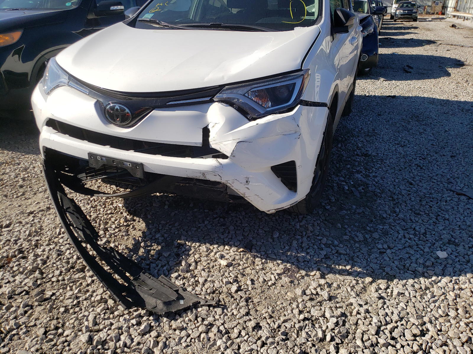 Photo 9 from auction – 2018 TOYOTA RAV4 LE with VIN 2T3BFREV7JW765008