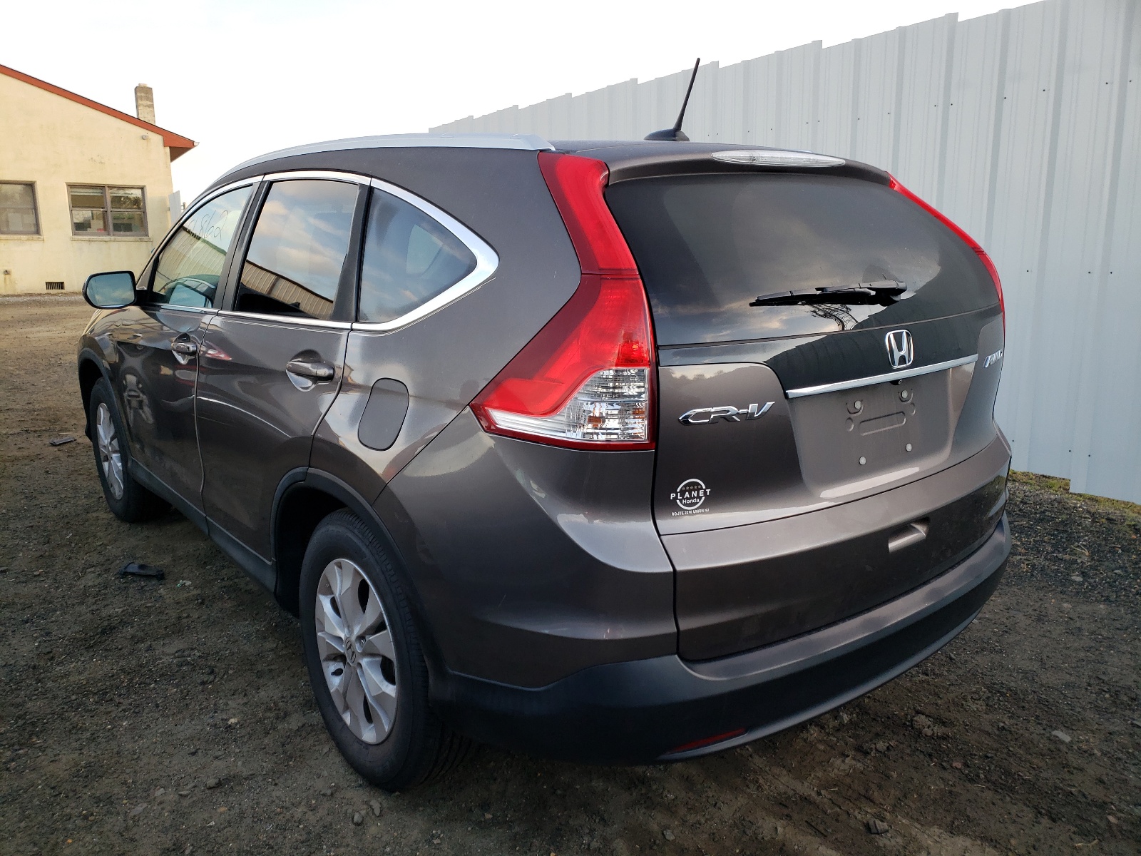 Photo 3 from auction – 2014 HONDA CR-V EXL with VIN 2HKRM4H78EH667350