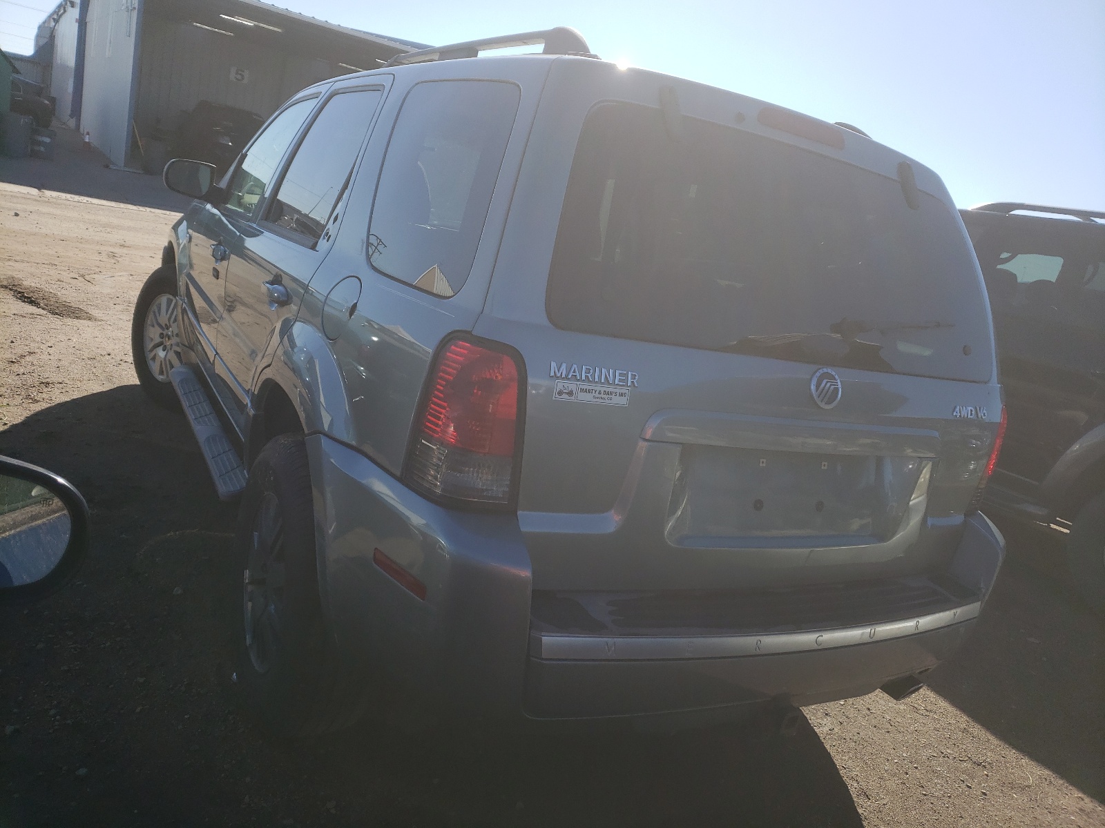 Photo 3 from auction – 2006 MERCURY MARINER with VIN 4M2YU57126DJ09378
