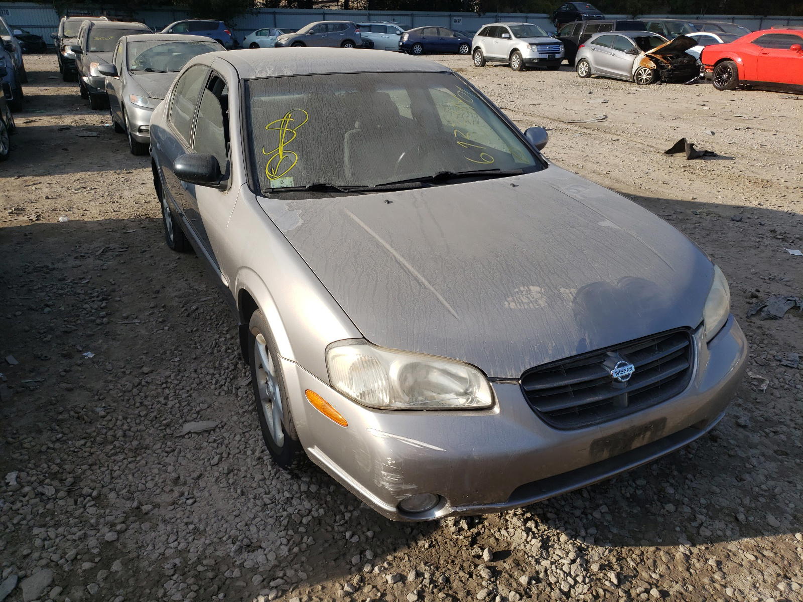NISSAN MAXIMA GLE 2000 with VIN JN1CA31D7YT764339 - Photo from auction