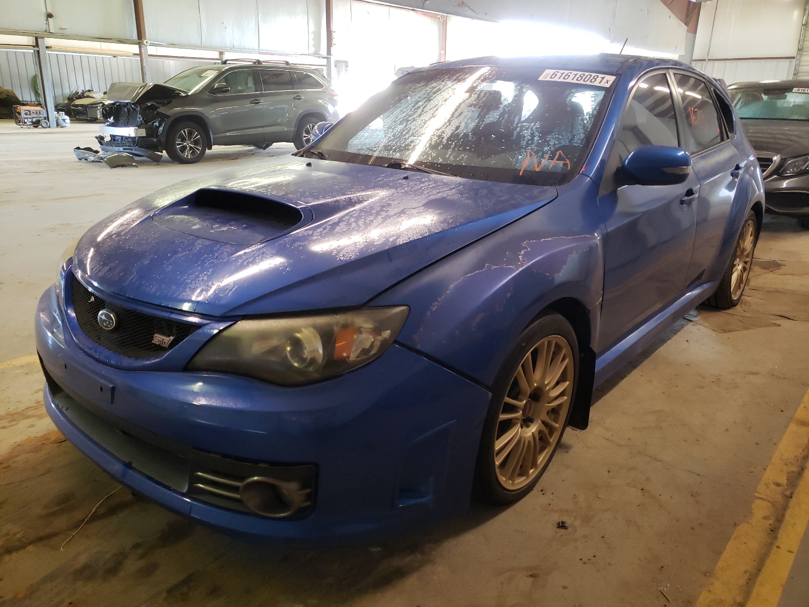 Photo 2 from auction – 2009 SUBARU IMPREZA WR with VIN JF1GR89619L802892