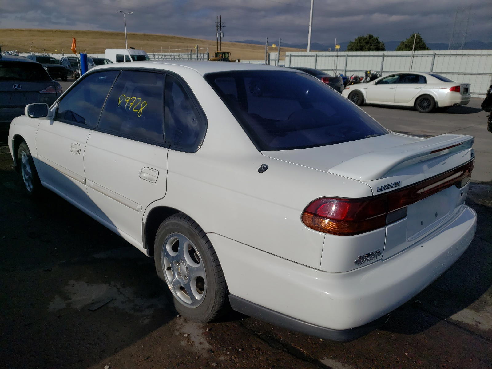 Photo 3 from auction – 1995 SUBARU LEGACY LS with VIN 4S3BD6550S7229129