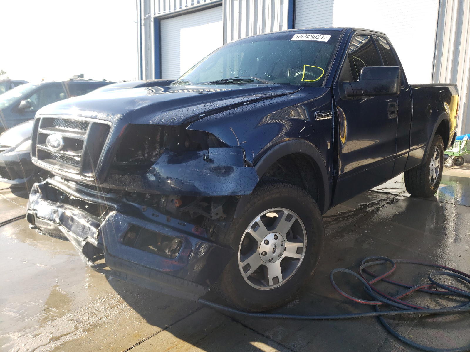 Photo 2 from auction – 2004 FORD F150 with VIN 1FTRF14574NA69651